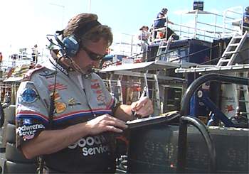 Kevin Hamlin makes adjustments before the race.
